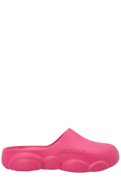 Moschino Mules With Embossed Logo In Pink & Purple