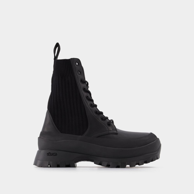 Stella Mccartney Trace Recycled Knit Combat Booties In Black