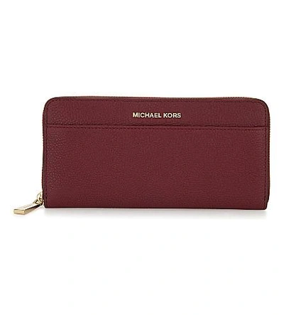 Michael Michael Kors Mercer Continental Leather Wallet In Mulberry