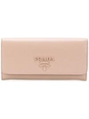 Prada Logo Plaque Continental Wallet In Nude & Neutrals
