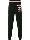 Moschino Logo Printed Track Pants In Black