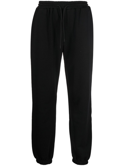 Msgm Logo-embroidered Fleece Track Pants In Black