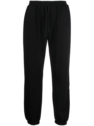 Msgm Logo-embroidered Fleece Track Pants In Schwarz