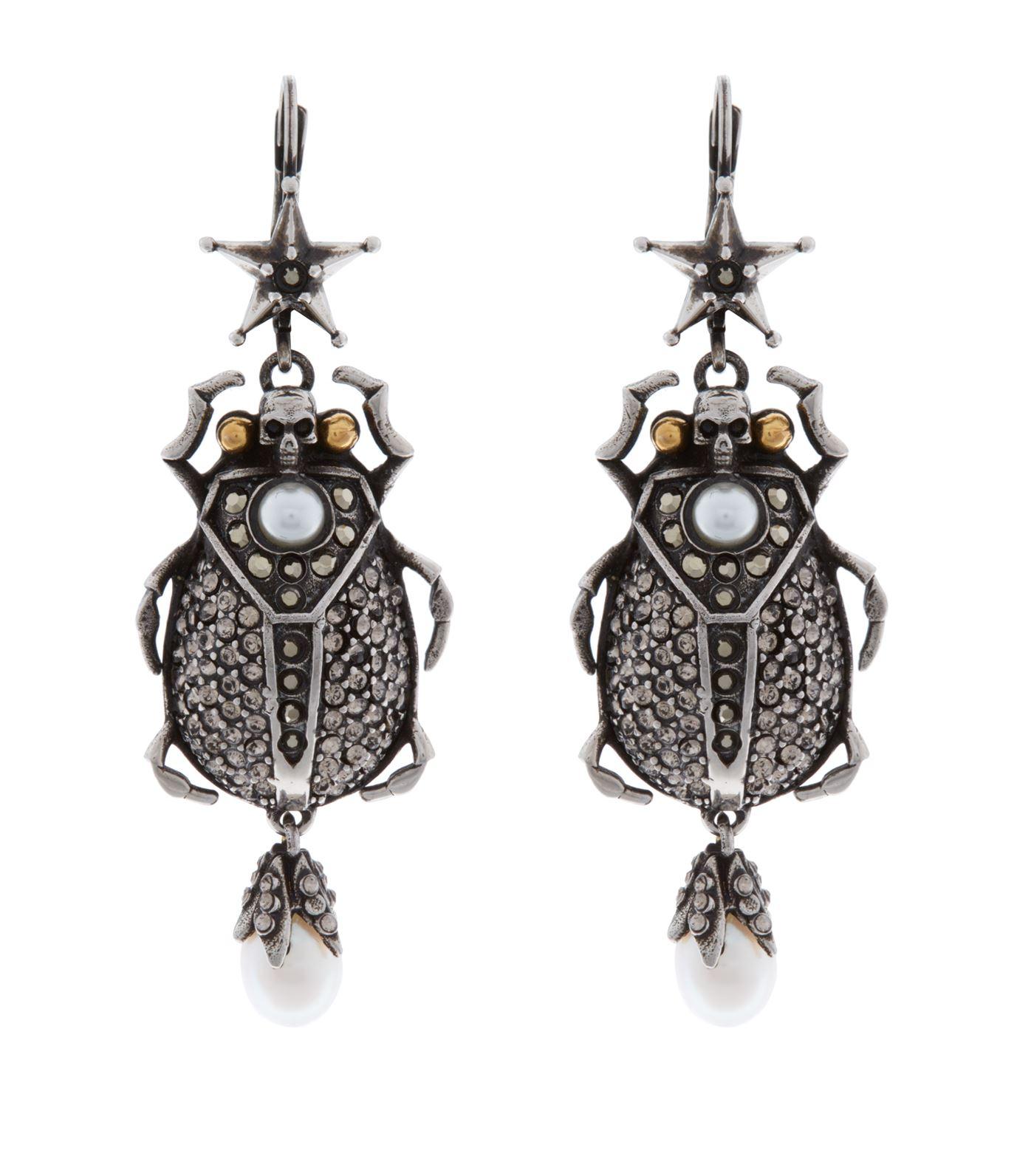alexander mcqueen beetle earrings