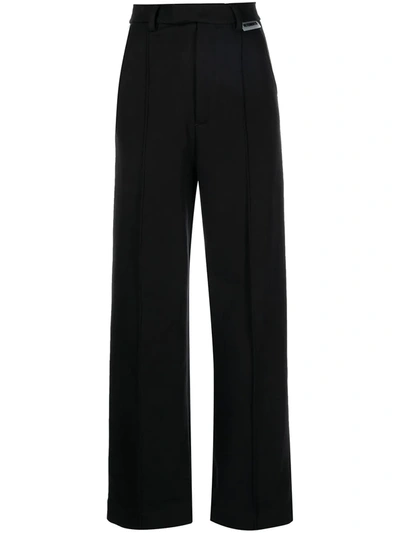 Vetements Logo-patch High-waisted Trousers In Black