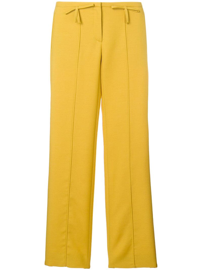 yellow flared trousers