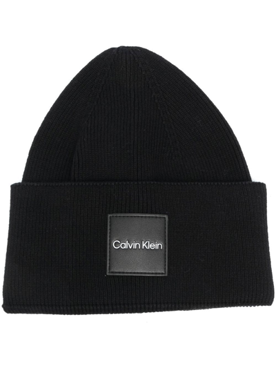 Calvin Klein Logo-patch Knitted Beanie In Black