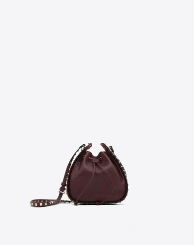 Valentino Garavani Rockstud Small Bucket Bag In Dark Purple