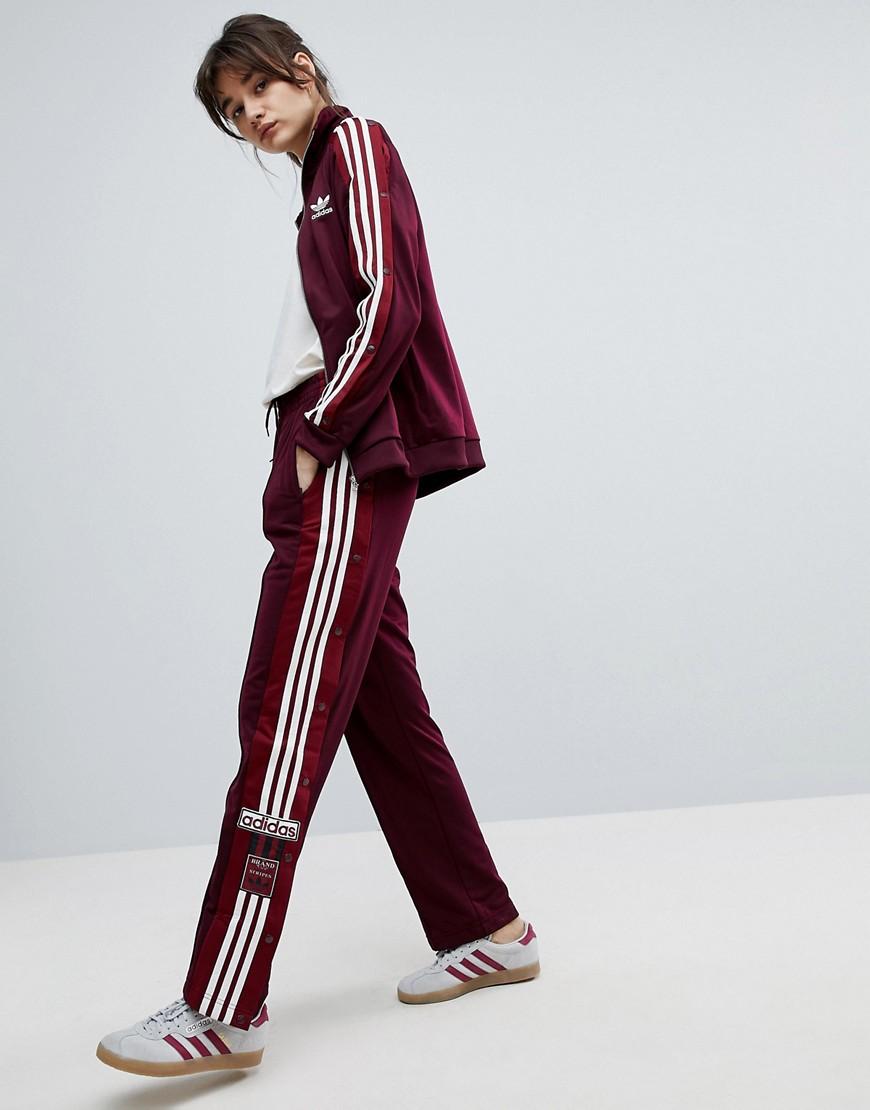 popper track pants