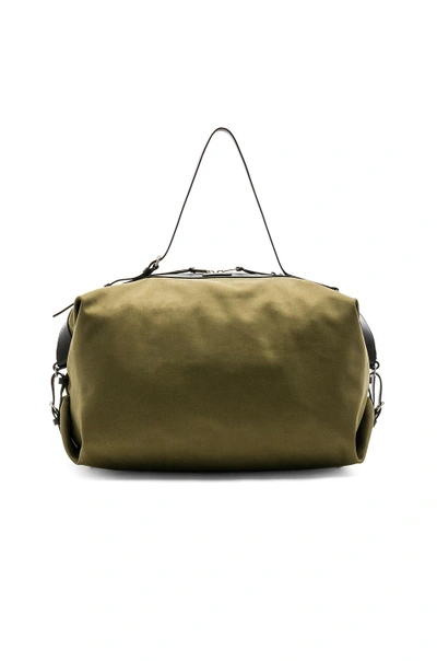 Saint Laurent Convertible Leather-trimmed Canvas Holdall In Green