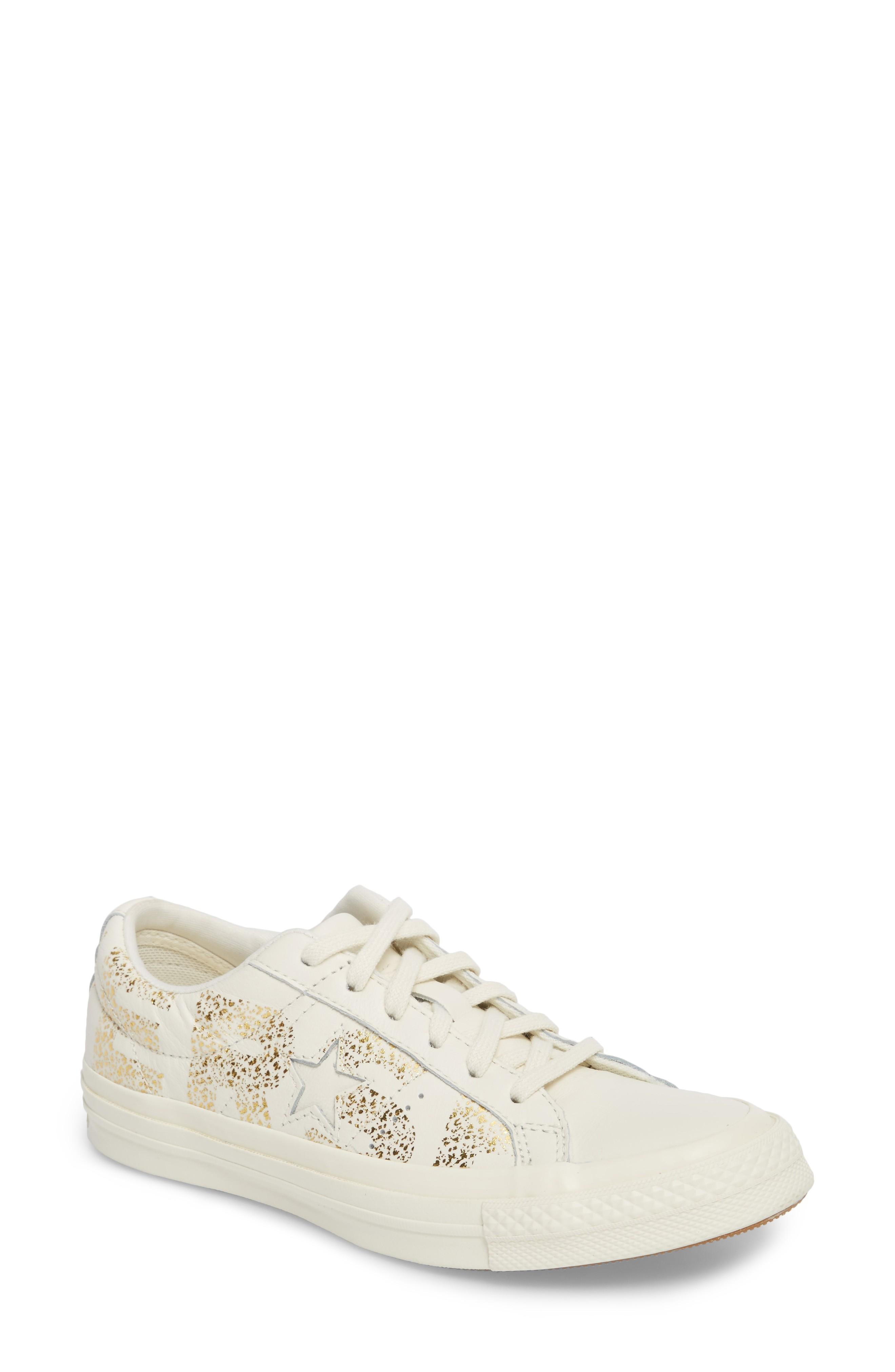 gold converse one star