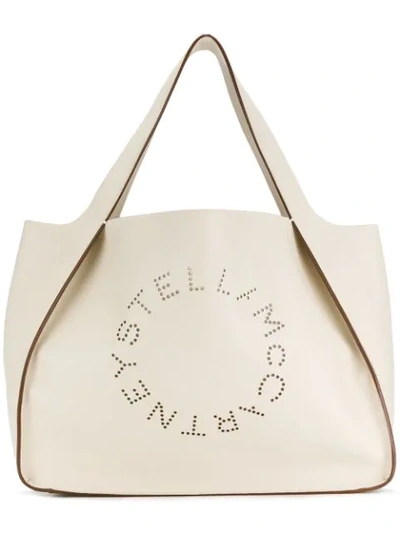Stella Mccartney Medium Perforated Logo Faux Leather Tote - White In Neutrals