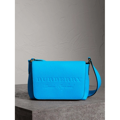 Burberry Small Embossed Neon Leather Messenger Bag In Neon Blue