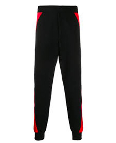 Alexander Mcqueen Logo Patch Jogger Trousers In Black