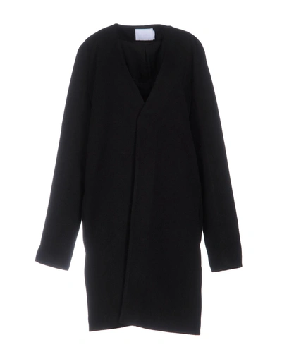 Adyn Overcoats In Black