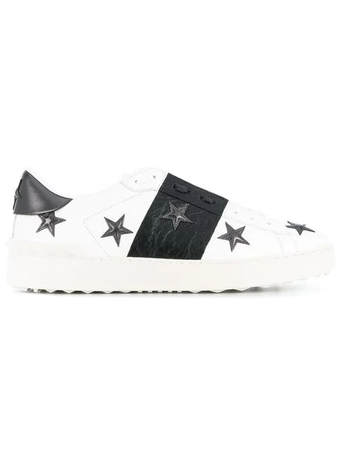 white leather sneakers with stars