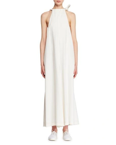 The Row Japron Sleeveless Halter Wide-leg Stretch-cady Jumpsuit In Off White
