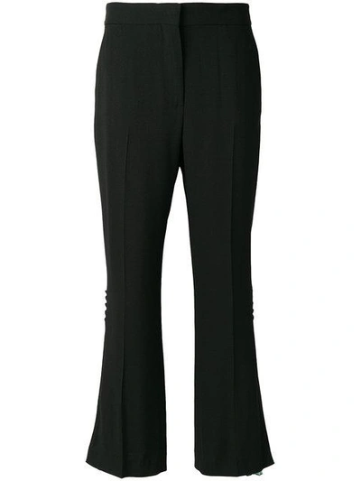Msgm Floral Insert Flared Trousers In Black