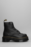 Dr. Martens' Sinclair Combat Boots In Black Leather