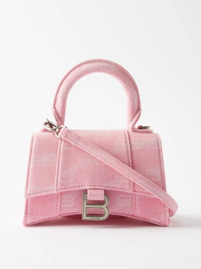 Balenciaga Hourglass Xs Logo-print Denim Cross-body Bag In Pink