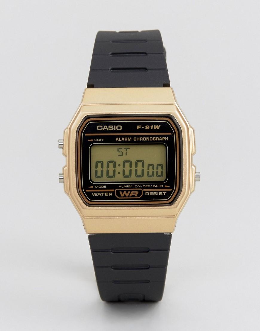 casio gold and black digital watch