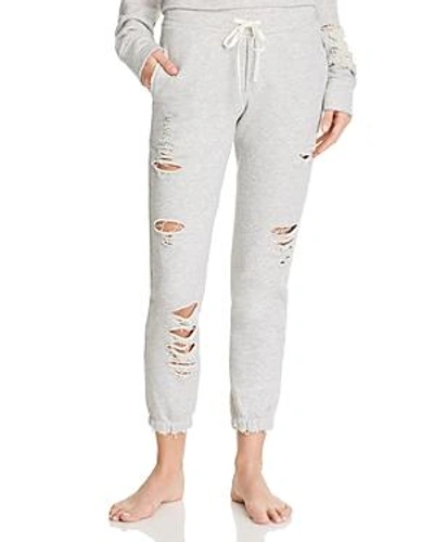 Alo Yoga Distressed Sweatpants In Heather Grey/ Distressed Holes