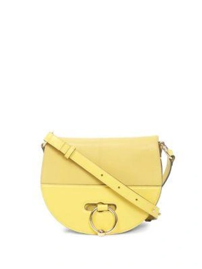 Jw Anderson Pierced Leather Latch Bag In Maize