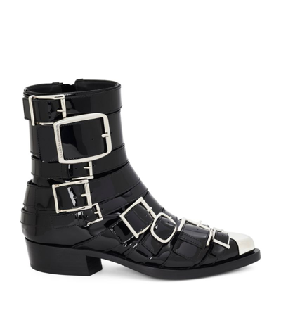 Alexander Mcqueen Buckle Detailed Ankle Boots In Black