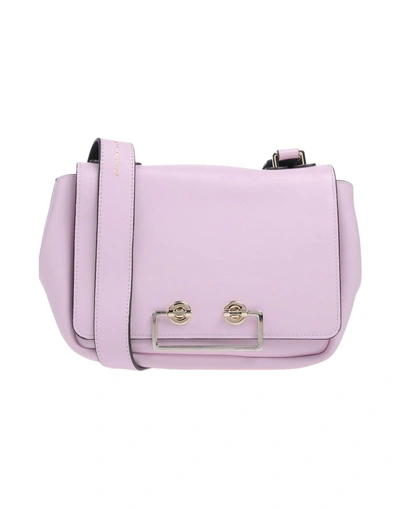Coccinelle Cross-body Bags In Pink