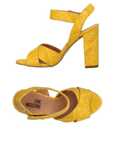 Love Moschino Sandals In Yellow