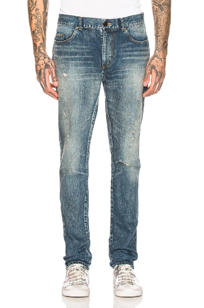 Saint Laurent Dirty Skinny Jeans In Blue In Faded Medium Blue