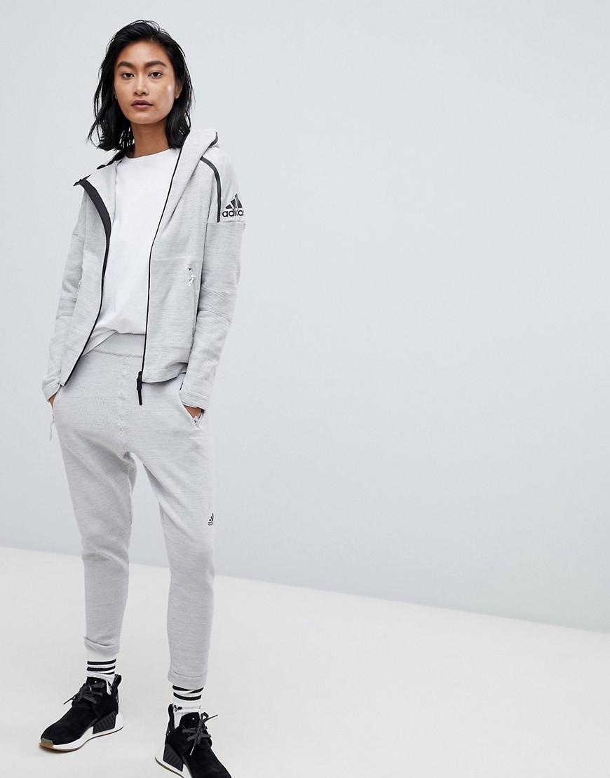 all white adidas tracksuit
