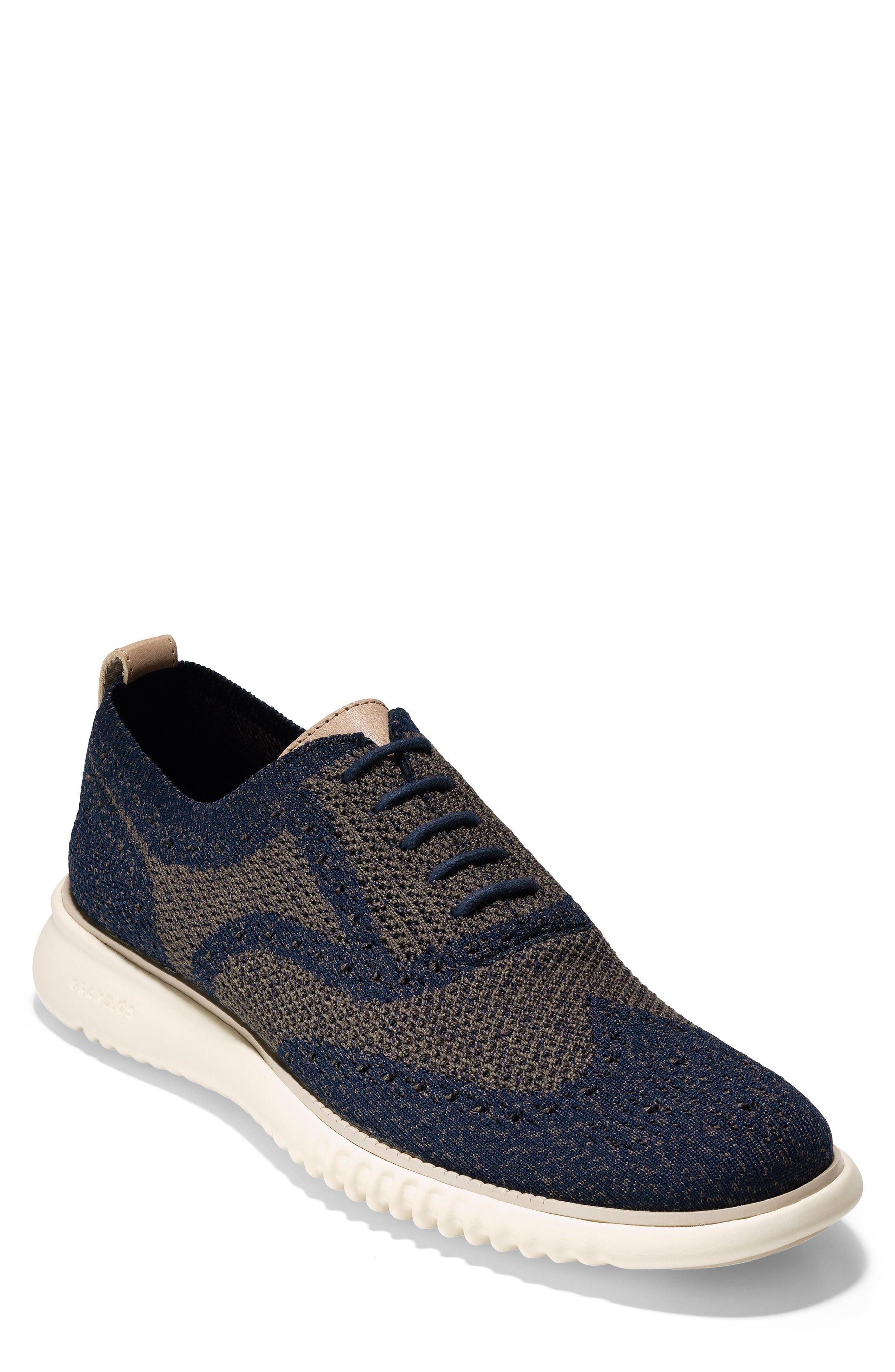 Cole Haan 2.zerogrand Stitchlite Water Resistant Wingtip In Navy/ Morel ...