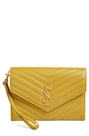 Saint Laurent Monogram Embossed Leather Clutch In Yellow