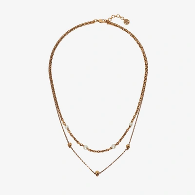 Alexander Mcqueen Pearl And Skull Necklace In Antique Gold