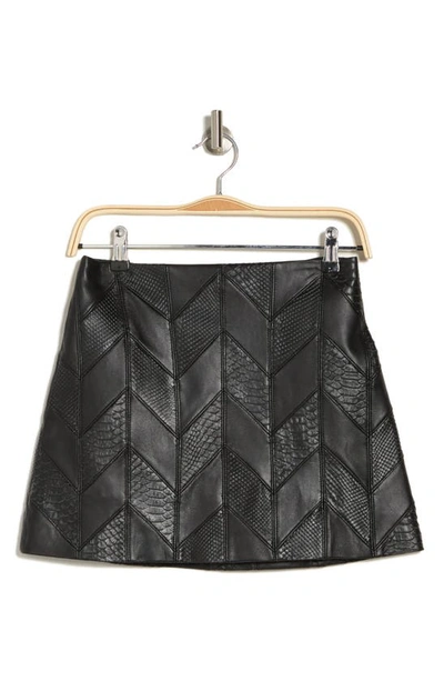 Alice And Olivia Riley Croc-embossed Leather Chevron Miniskirt In Black