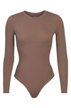 Skims Fits Everybody Long Sleeve Thong Bodysuit In Umber