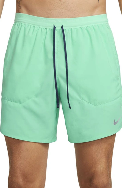 Nike Dri-fit Stride 2-in-1 Running Shorts In Light Menta/ Midnight Navy