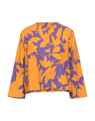 Niū Overcoats In Orange