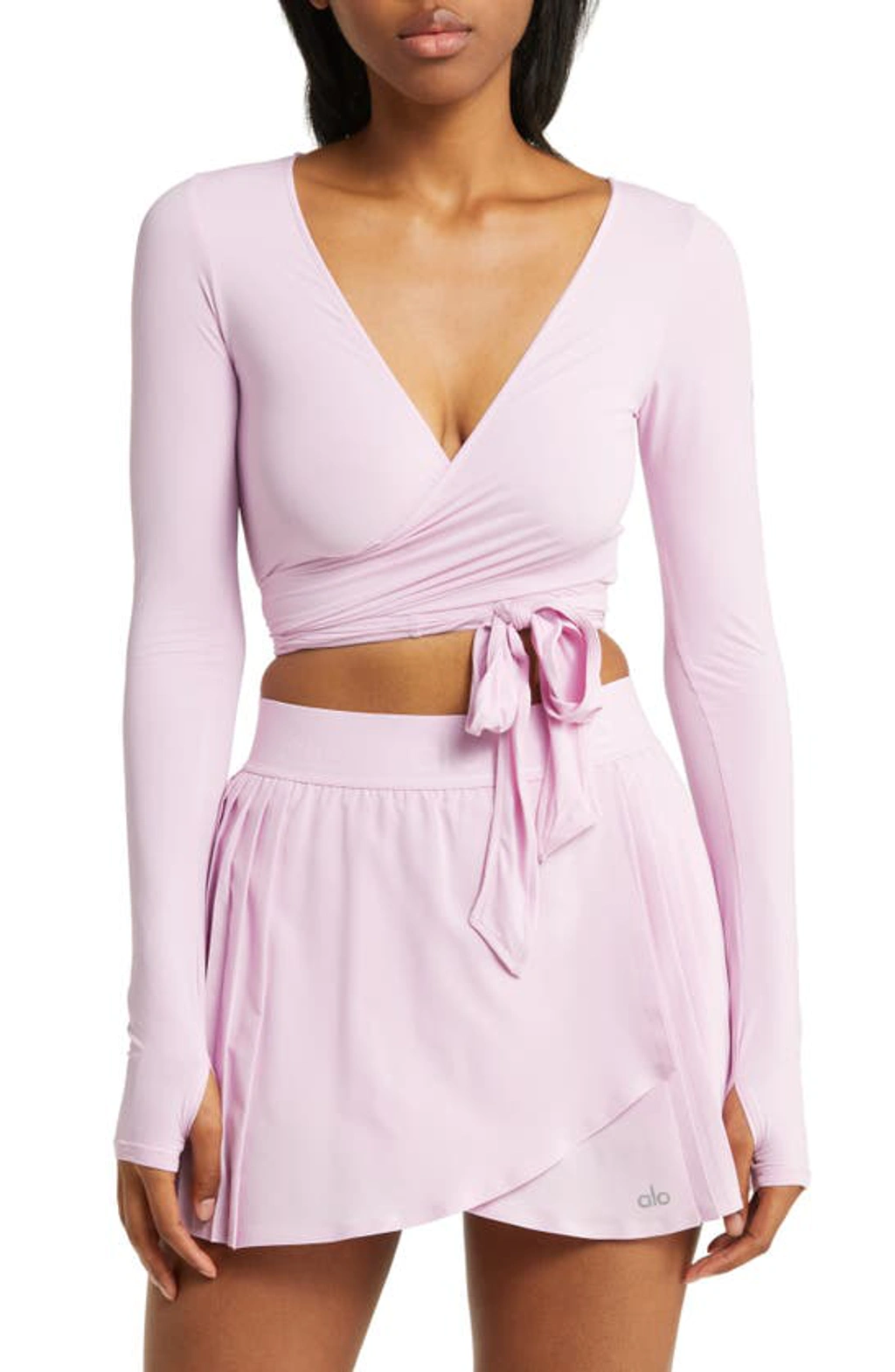 Alo Yoga Escalate Long Sleeve Wrap Crop Top In Sugarplum Pink