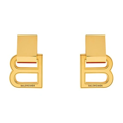 Balenciaga Hourglass Brass Earrings In Gold