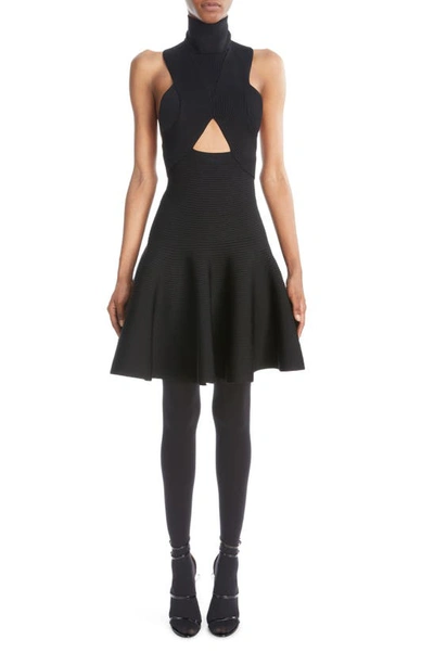 Alaïa Circular Cutout Turtleneck Rib Sweater Dress In Nero