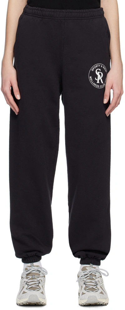 Sporty And Rich Sporty & Rich Logo Printed Pocket Detailed Pants In Black