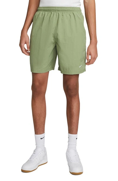 Nike Solo Swoosh Water Repellent Stretch Nylon Shorts In Grün