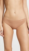 Calvin Klein Underwear Invisibles Thong In Bronzed