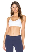 Alo Yoga Alo Sunny Strappy Sport Bra In White. In White Glossy