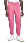 Nike Dri-fit Standard Issue Joggers In Pinksicle/ Pale Ivory