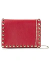 Valentino Garavani Rockstud Leather Clutch In Red