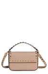 Valentino Garavani Rockstud Leather Top Handle Bag In P45 Poudre