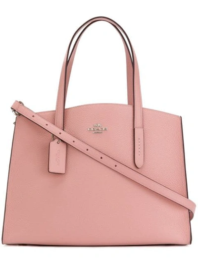 Coach Charlie Carryall In Pink